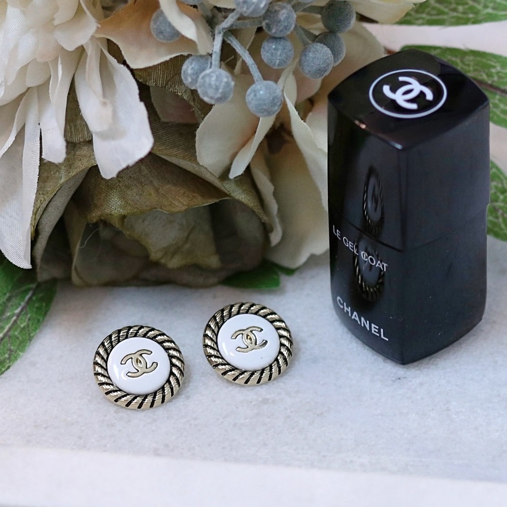 Authentic Chanel button stud earrings - White